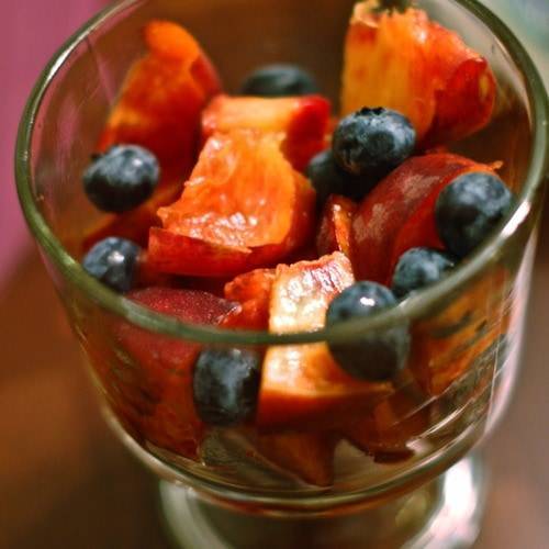 Fruit in a clear glass container.