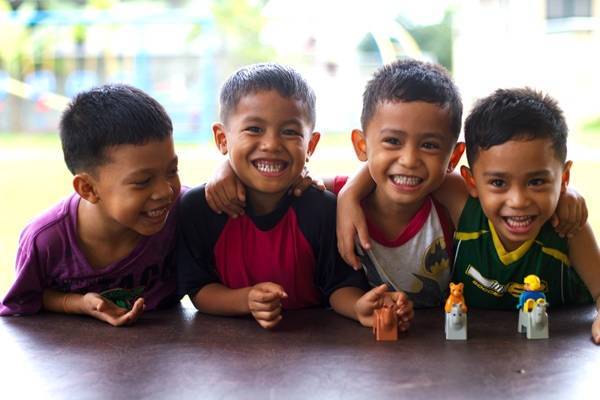 Young boys smiling.