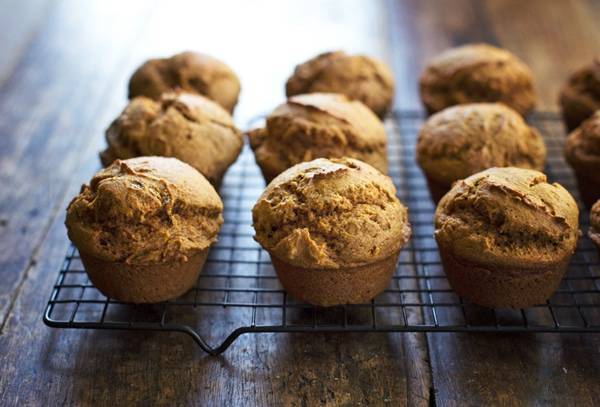 Maple Glazed Pumpkin Muffins on a drying rack.