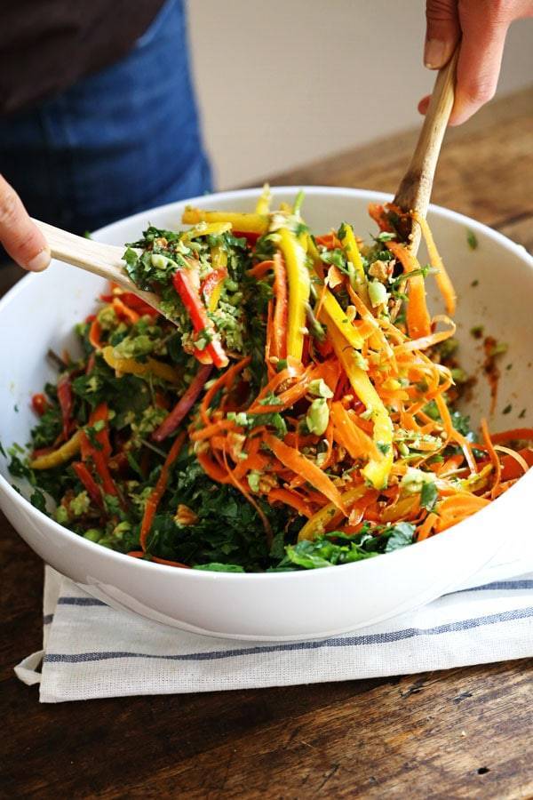 Chopped Thai Salad with Sesame Garlic Dressing in a mixing bowl.