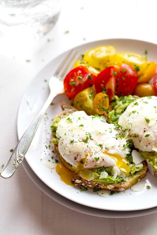 This Simple Poached Egg and Avocado Toast recipe is so simple and so delicious! Real, healthy food never tasted so good. YUM! | pinchofyum.com