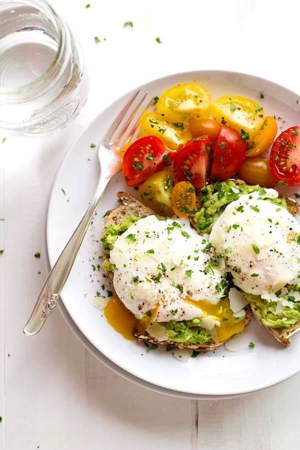 This Simple Poached Egg and Avocado Toast recipe is so simple and so delicious! Real, healthy food never tasted so good. YUM! | pinchofyum.com