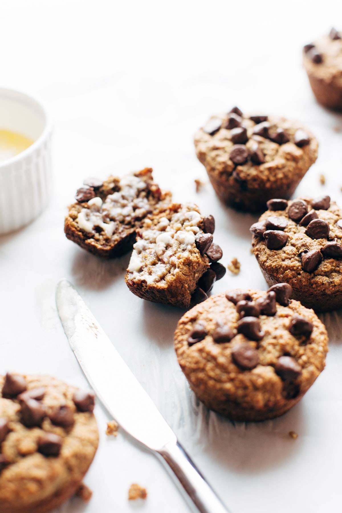 Banana Bread Muffins with a knife