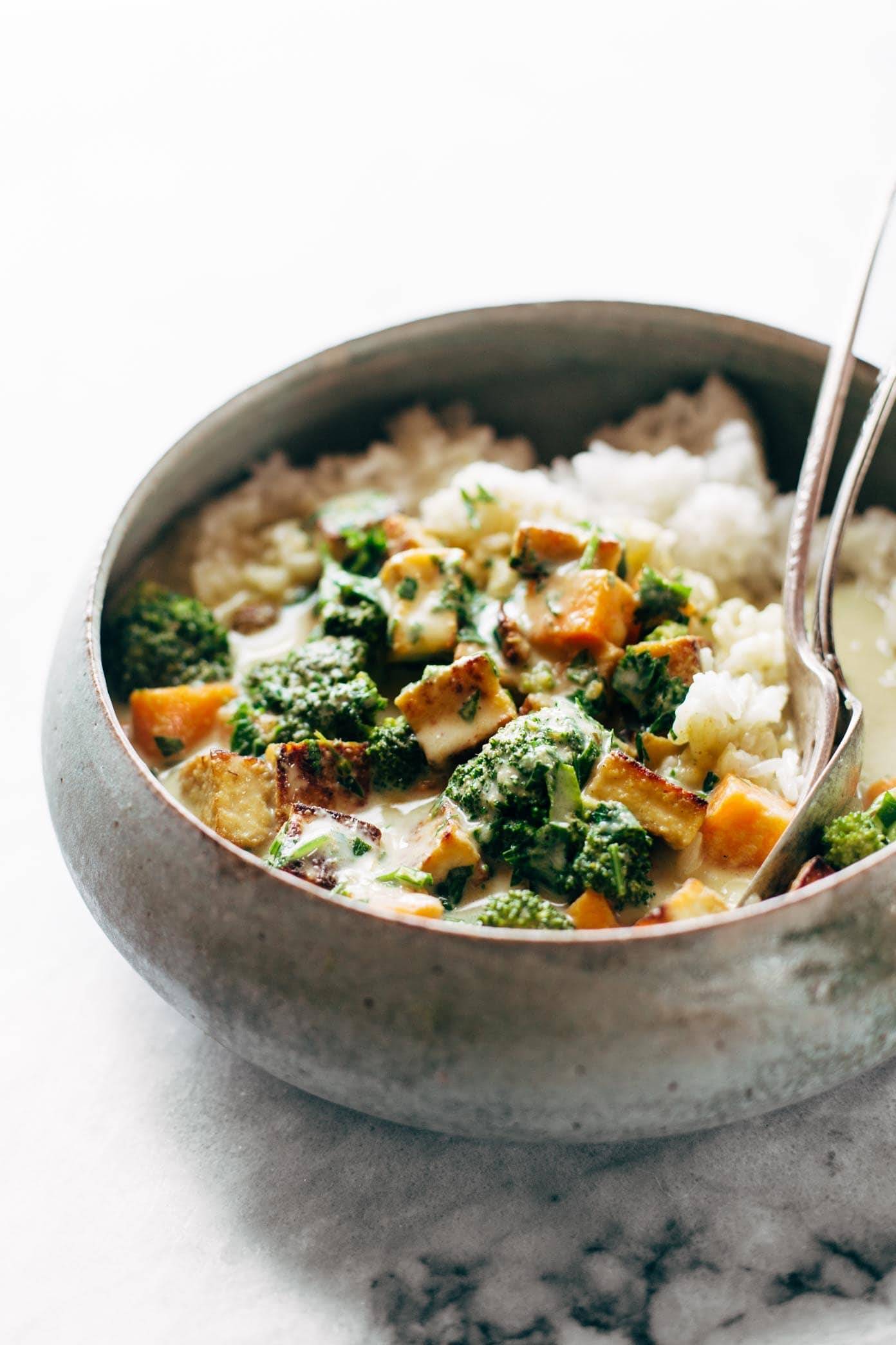 5-Ingredient Green Curry! packed with tons of veggies, an easy green curry sauce, and finished with golden raisins and cilantro. Easy! | pinchofyum.com