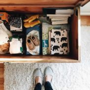 Baby items in a chest.