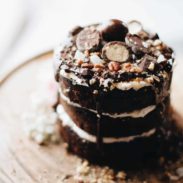 Chocolate cake on a cake stand.