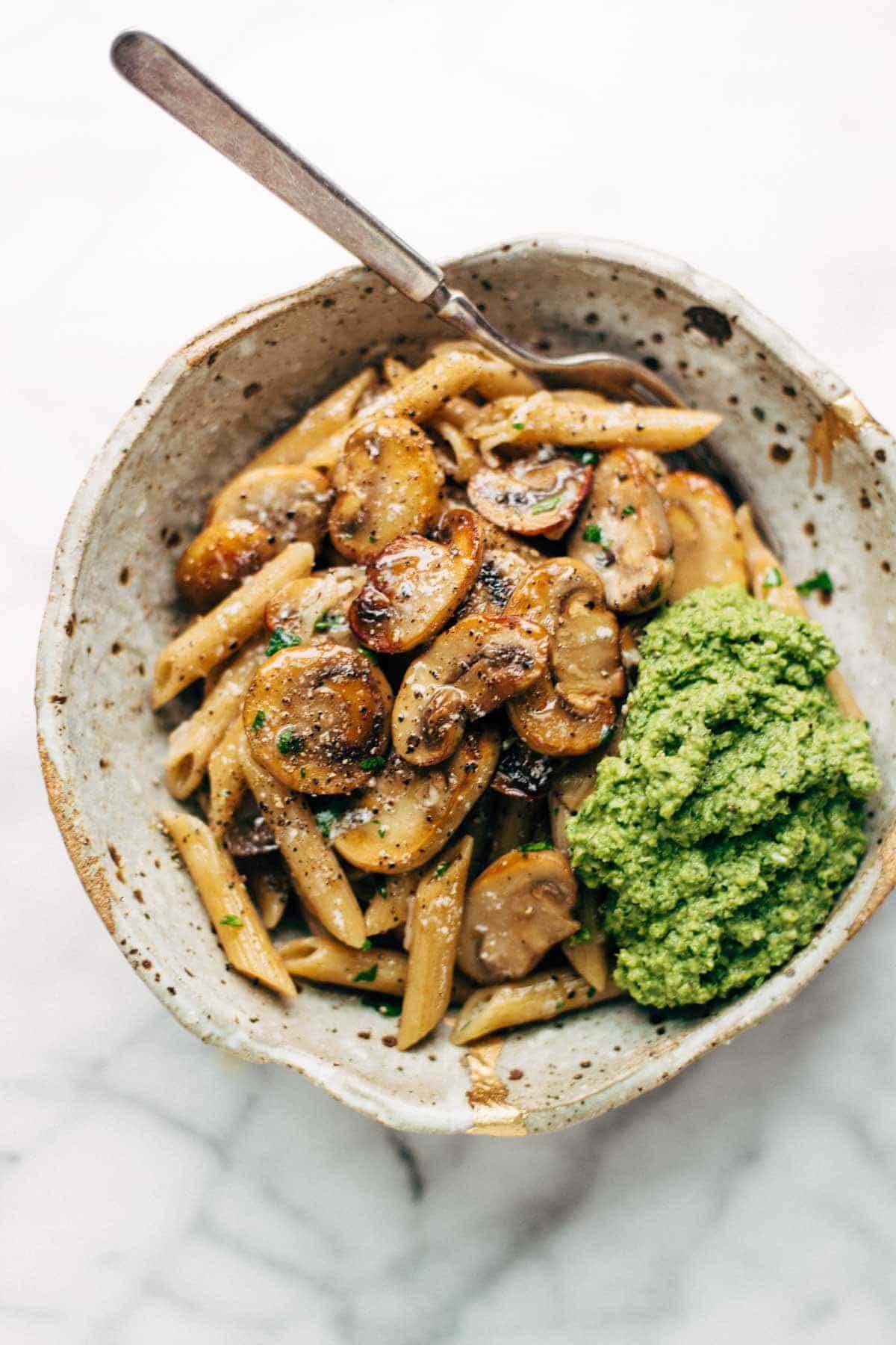 Simple Mushroom Penne with Walnut Pesto - made with easy ingredients like Parmesan cheese, whole wheat penne, mushrooms, garlic, and butter. Vegetarian. | pinchofyum.com