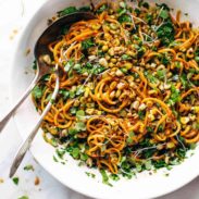 Sweet Potato Noodle Salad in serving bowl with spoons.