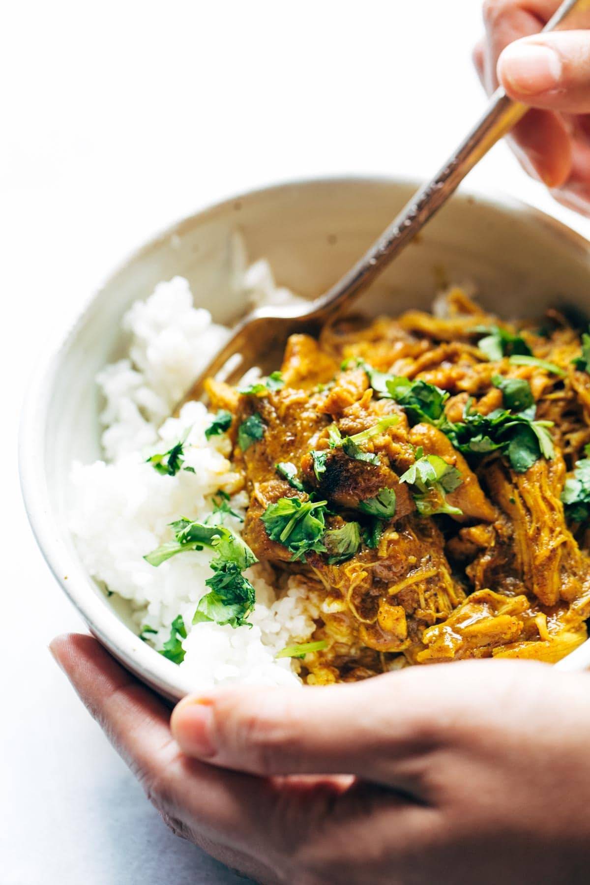 Coconut Tandoori-Inspired Chicken in a bowl with rice.