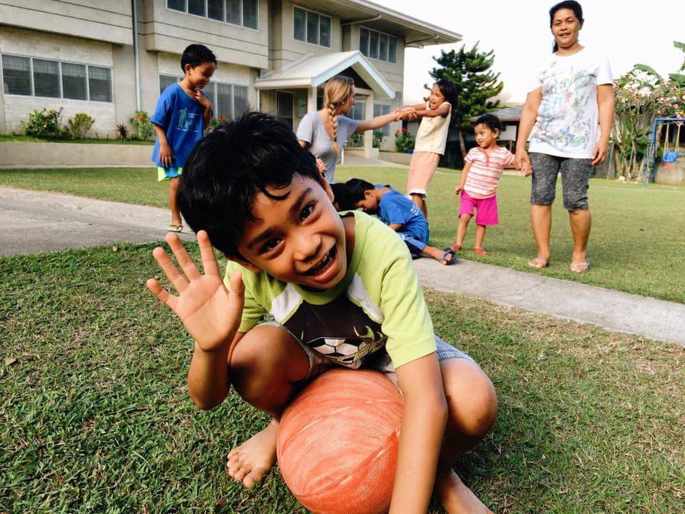 Young boy with a ball.