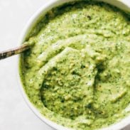 Magic Green Sauce in a bowl with spoon.